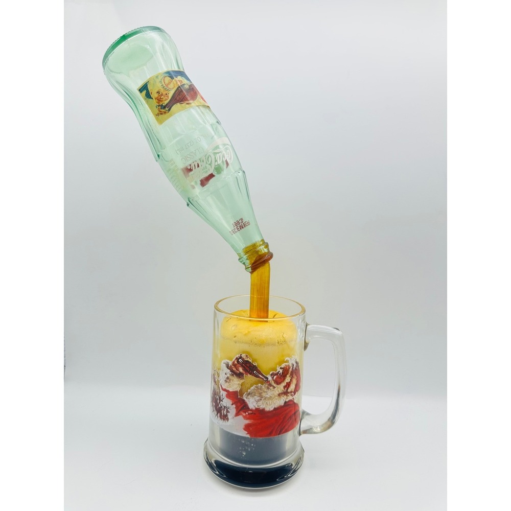 Vintage 1993 Coca-Cola Flowing Bottle Santa Mug Gravity Display Soda Memorabilia